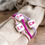 PULSERA DE CERÁMICA VIRGEN DE LOS LLANOS FUCSIA